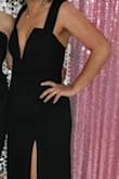 I loved this dress, it made me feel stylish but elegant! I did not need to alter in any way - the bust has a wire on the edges of the V that keep the girls in place no matter how you move, bend or twist your body. I danced all night with no worries! The wire may sound uncomfortable but it's not at all - it actually makes the upper part feel stable. The style at the top is what makes this dress. I highly recommend! - Emogene H.