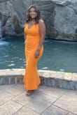 The dress fitted perfect and the color was exactly ans pictured. The  only thing it ran long and because I'm only 5ft and wanted heels to show had to get it tailored but otherwise the material was perfect and received so many compliments! - Frances O.