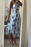 I absolutely love this dress very cute, it does bunch in the back b/c the slip is sewn into the dress and the zipper. The slip underneath is short and form fitting, not flowing like the dress - Kori H.