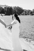 I ordered about 20 lulu dresses and this was the "one" from early on. It fit perfectly and was appropriate for me. I am an older bride and this was my second time down the aisle. It was a small, intimate wedding of 30 people. It was incredibly comfortable. I was able to wear a regular bra. The lace cap sleeve added such a nice feminine touch, without completely revealing my arms. It was too long and needed to be altered, but to me no fault of the dress. I'm short... It was a very heavy dress but it made it drape so beautifully! You can't go wrong with this dress! - Franceska L.