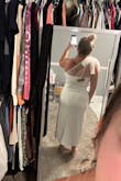 A perfect choice for my rehearsal dinner! I did have to exchange it originally from a large to an XL because I couldn't zip it up over my back but the XL is a little looser but still very cute. I love the tie with the pearls! - Cherokee S.
