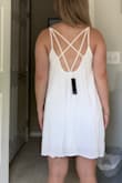 I bought this for any potential wedding event coming up; it is casual but does not look or feel cheap. It is definitely a safety dress for me that will be a go to for any event if needed. Straps are not adjustable but I felt the dress sat in a spot I could not wear a bra and also not feel exposed- happy purchase would buy in other colors! - Haylie D.