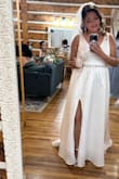 I ordered an XL but lost weight and had it taken in. It's a bit long, had to get that shortened. Overall the dress met my expectations! I loved it! I am very satisfied with my purchase. I was a beautiful bride! - Wendy R.