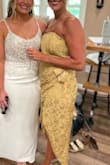 I ordered this dress for my daughter's wedding. I absolutely loved the color and the fit. Slit was a bit high but I was careful. The disappointment came halfway thru my daughter's reception the metal bustier that is built in tore thru the fabric and I had to take off the dress. They did warn the fabric was delicate but it didn't even hold up thru my daughter's reception. I loved the dress but was very disappointed it did not hold up. - Jeanne T.
