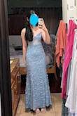 Bought this to wear as a Wedding Guest, very form-fitting and a nice heavy fabric with delicate but strong detailing.  Is a little long even with heels. I'm 5'6 with heels and it still slightly grazed and touched the floor.  Definitely if you are around my height, wear higher shoes if you don't want it to touch.  I'm in love with the color, best dress I've purchased from Lulus! - Ashley N.