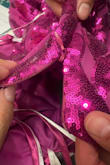 The item I received was damaged from the zipper in the back, it doesnt zip up all the way. I would like a refund - Priscila A.