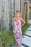 I usually never write reviews but this dress definitely deserves one. Absolutely gorgeous. The quality alone is something to brag on. The colors are so bold and beautiful. The pattern is stunning. The gold sparkly detailing is eye catching. Not to mention, the straps are adjustable! I wore this dress to a wedding in California. It was 100 degrees outside but this dress is so light weight, flowy and breathable. I was so comfortable in it all day/night. I received endless compliments on this dress. 10/10 recommend. 
Quick FYI I am tall (5'9") and the back of the dress hit my ankles so if you are shorter you may need to hem this of wear tall heels. - Shannon O.