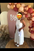 This dress fit like a glove. I wore it for my bridal shower. - Amanda R.