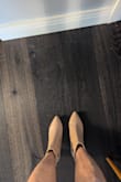 I purchased these in a size 9 and absolutely love them. They're true to size and so comfortable. The leather also looks expensive. They look amazing with my dresses. - Kimberly D.