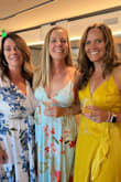 I wore this dress for a summer wedding. The color is beautiful and vibrant just as pictured on the model. I ordered a medium, and it fits true to size. I wear a bra size 34A but on the smaller side. It was a little big but wore cake pads and used double-sided tape to keep the dress in place. - Teri K.