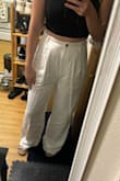 For my height it drags to the ground but I love the fit! I wear with high-waisted pants, looks so good and comfortable. It's not see through like other white pants. Totally recommend this will be my go to pants in summer!! - Saki P.
