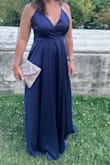 This dress was very pretty and I received a lot of compliments. I did have the dressed altered in the length and the bust area stitched. The bust area felt to big and was kind of loose so I felt my bra was seen all night. FYI, a strapless backless bra is needed. - Jamilynn F.