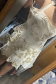 I ordered this dress to wear to one of my engagement parties; it was too big on me, especially in the chest area, so I decided to get it altered. It's super pretty, and the fabric is amazing, I think it would've been a 10/10 if it wasn't for it being so huge. - Mariel R.