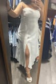 This dress is amazing. I bought it for my engagement photoshoot and fell in love with it the minute I put it on; it's so flattering! I'm super self conscious of my tummy, and this dress made me look so slim! I'm very short so the dress was a bit longer than expected but it still looks amazing. 10/10 would recommend buying. It's even prettier than in the pictures!! - Mariel R.