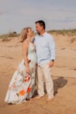 I got this dress for my engagement pictures and it's FANTASTIC. The fabric is so thick and luxurious. The colors are stunning and it is soooo flattering. Seriously, get it in every color. - Robin B.