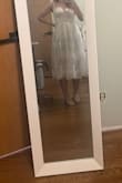 I ended up returning this dress but I loved how it looked not on me. It would look stunning on someone with a more petite build. The corset top made me look bulky because I have a bigger chest and athletic build. - Mykayla F.