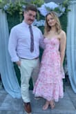 I purchased XS. I loved the fit of the dress and it looked great! I got compliments on it all night. It was pretty comfortable (slightly hard to zip up but once it was there it was great!). I'd recommend wearing boombas if you're smaller in the chest. Overall a super cute and flowy dress for a summer wedding! - Tess W.