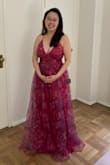 Dress is a beautiful shade of magenta, and it offers the wearer a very sexy but classy look. Agree with a majority of reviews that this dress runs SMALL. I am normally a size 8/M and I ordered the L, which fits great (not too tight). My only issue with the dress is that the zipper tends to get stuck so I am nervous about it breaking. All in all, this item is a solid 4.5/5 stars for me! - Stephanie Y.