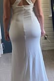 Comfortable and cool for a summer wedding. Did not need to hem w/3-inch heels. A little too wide on the chest area, just needed a little stitch to bring in near the zipper/straps. Nice lining. - Virginia M.