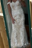 Quality is great. I chose white for color but still had a tan/beige underneath the beaded layer making it more of an ivory dress not bright white. Will need to alter the back to fit, as I can't zip it up a couple of inches. - Paige M.