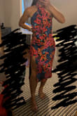 The colors are very nice together and suit my skin tone well. I love how light weight and breathable the dress is. The slit does come up higher than I would prefer but I also don't show off too much. I have a smaller chest and I am nervous I may slip out but plan to use tape. Can't wait to wear it! - Megan S.
