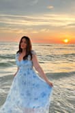 I couldn't get over how gorgeous this dress is in general but you throw it on in front of the ocean and man does she pop! Absolutely such a gorgeous and flowy dress. I was in temps of 111 and she's so light weight I was so cool and comfortable! - Casey L.