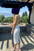 I'm often a size small and occasionally a size medium and the medium was definitely more comfortable. I'm also 6'0 so the length on the top was better with the M. I absolutely loved wearing this, used a sticky bra and got so many compliments as a bachelorette. It shows off your curves but is classy. - Alyssa C.