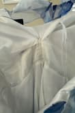 The material felt very cheap and it was sewed where it wasn't supposed to causing the dress not to zip although it was my size. Very disappointing because was excited to wear it since it looked great in the pictures. I personally don't recommend. - Genesis A.