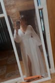 I love this dress! I thought maybe the sleeves would make it too hot but it is perfect! For my shorter girls, it maybe needs an inch or two taken off with heels on. The fabric is wonderful. I have a sternum tattoo that pops up a bit in the V so I may alter that, but overall, this dress is a great pick!!!! - Payton N.