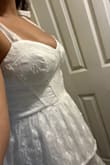 It's giving church girl vibes. The dress tiers start too high up basically eliminating any flattering curves to show. Dress seems to be made for a more straight waistline, not really curvy. Material felt a little cheap. Was supposed to get hitched in this dress at my county's city clerk's office, and now this is another disappointment on my "wedding" day. - Aliyah P.