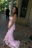 The dress was beautiful. It's made very nicely! A great color and material. The front was a bit long and over time the dress was a bit heavy. Possible could have added straps. Regardless, a lot of compliments were given on this dress! - Janelle M.