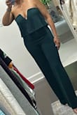 Luxury jumpsuit without the high sticker price! Gorgeous! Form fitting. Flattering style. Classic look. Comfortable stretch knit fabric. No bra needed as it fits/holds perfectly with the hidden V-bar, and no-slip strips. Got this in the Emerald Green! LOVE it! Would buy it in every color! Color is lighter online (right photo) but the deep emerald is perfect for my complexion! - Nicole F.