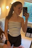 Love the material, fit and the ability to wear with basically any bottoms! Didn't get a picture of when I actually wore it out but this is a picture from my try-on. - Alyssa P.