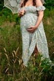 Super cute and airy! I ordered a medium and a large and could have gone with the medium but went with the large because I'm 7 months pregnant and wanted the comfier fit. It was beautiful for my maternity shoot and will be great after I have baby also! - Ally G.