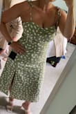 This dress fits true to size and is perfect for an outdoor wedding. The length makes the casual style of the dress more formal. I like the stretch material in the back by the zipper which allows for flexibility and give when moving or dancing. Love it! - Olivia D.