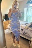 Love this dress! Wore it to my friend's wedding; I felt so good in it. The ruche is extremely flattering and the fabric is soft, stretchy and very comfortable. The slit wasn't too high and was a perfect balance of pretty but fitted. 10/10 recommend - Sierra B.