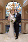 We planned a last minute wedding to Vegas for the month of June and wanted something elegant, simple, yet tasteful, with a little bling, but not overwhelming. I am the type who loves unique items that aren't like everything else, and this dress was absolutely stunning and perfect for my wedding dress. We were married at Caesar's Palace and I didn't want something that would be heavy and hot, and this was perfect and extremely comfortable! I did pay to alter it slightly around the chest and stomach area, but it still looked great even if I hadn't taken it in an inch. We walked around after our wedding and received SOOOO many compliments, felt like a queen! Highly recommend this dress and the shoes were the perfect fit and accessory! Thank you so much for this beautiful dress to make our day even more special!! - Patrick C.