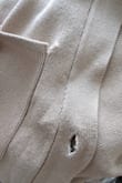 For the price, I expected better quality. The stitching of the front pocket was coming undone and there were single threads popping out in the stitching. The button holes look like the thread was unraveling. I'm returning. - Brianna G.