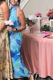 I loved this dress - I wore it for a bridal shower (I am a bridesmaid for the wedding). I don't usually wear form-fitting clothes but the mesh and ruching was very forgiving on my midsection. I had to use body tape because I am a size 32G - I could have gone without but it was just a preference. - Rebecca H.