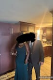 I bought 2 dresses in this color to see which would fit better, the Large ended up fitting like a glove and it was beautiful in person. The open back! I got lots of compliments on the dress and I was very happy with it. - Beverly J.