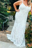 I had this dress on my wishlist for a long time and was going to order the 1X, but I eloped and needed it quickly so I went up to the 2X and it was perfect!  The proportion for my body was fantastic. It has a very nicely made nude underlay and I felt so comfortable!  I would recommend this dress! - Amy B.