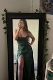 I was super scared this wouldn't fit but it fits perfectly. Its booby but perfectly not at the same time! Super long for the short girlies but alterations can  be made. I really love it! The slit is HIGH. Wear shorts or pin it. - Riley F.