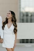 I wore this romper for my engagement shoot and it was perfect! Comfy material, very flattering. It's not too short or too long and the v-neck isn't revealing, which I liked! I'm usually a small but sized down to an XS which fit a lot better! - Kayla H.