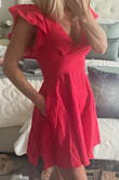 This red dress caught my eye and so happy I put it in the bag and bought! I'm petite frame 5'2", 100 lbs to give reference and ordered XS and fits perfect. I did have padded bra on when I tired on and would not wear as the natural bust line on this dress is better suited without bra or a sheer ...If you're small framed but busty, I would size up 1 size. It's linen material but good quality and has pockets that blend very well into the dress and the ruffled sleeves are a feminine touch. Super happy! - Laura S.