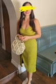 I ordered a M based on other reviews, but I felt it was loose and Small could have fit me more snug for a more voluptuous look. The chartreuse color really pops in person, and overall the dress is very comfortable and has stretch. I've worn it with evening shoes for cocktail parties as well as flats and sneakers for travel and leisure occasions. The only reason I gave 4 stars is because I had to pin the opening to prevent exposing myself while sitting down. - Nan T.