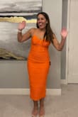 This dress doesn't *look* like it would be comfortable - but IT IS! Despite the bodycon tight nature of the dress the fabric helps make it feel very wearable. The color and design are so fun it just makes you happy wearing it! - Shannon H.
