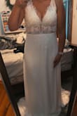 The dress was amazing looking! Was a little snug but it will work perfectly! Can't wait for my wedding to wear this dress. - Sarah K.