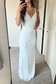 This dress is absolutely stunning, I ordered the S and it ran a little bit big on me so I immediately exchanged it for an XS! It's super comfortable and you can tell that the quality is super nice. This is definitely going to be my wedding dress. I'm so excited! - Lily W.