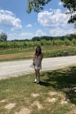 The ideal size and an adjustable top! It's really hard to wear with a bra, but still supports enough. I loved wearing it at the winery! - Tyler M.