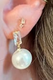 I bought these elegant and classy earrings for my wedding. They have the perfect amount of dangle to compliment but not take away from my dress. They are easy to put on and not heavy at all. - Madeline S.